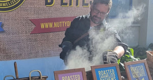 Iain - The Nut Man, cooking at the Nelson Market.